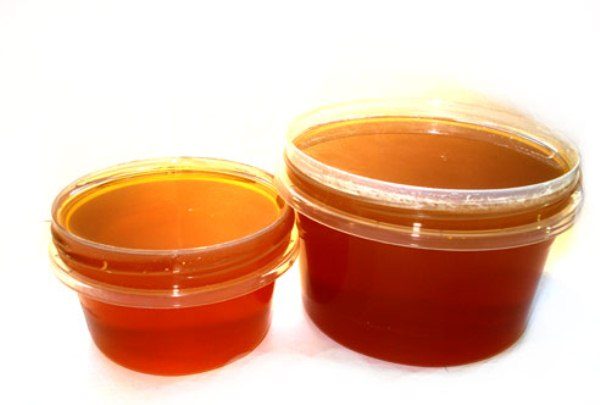  Espartacetovy miel dans un récipient en plastique